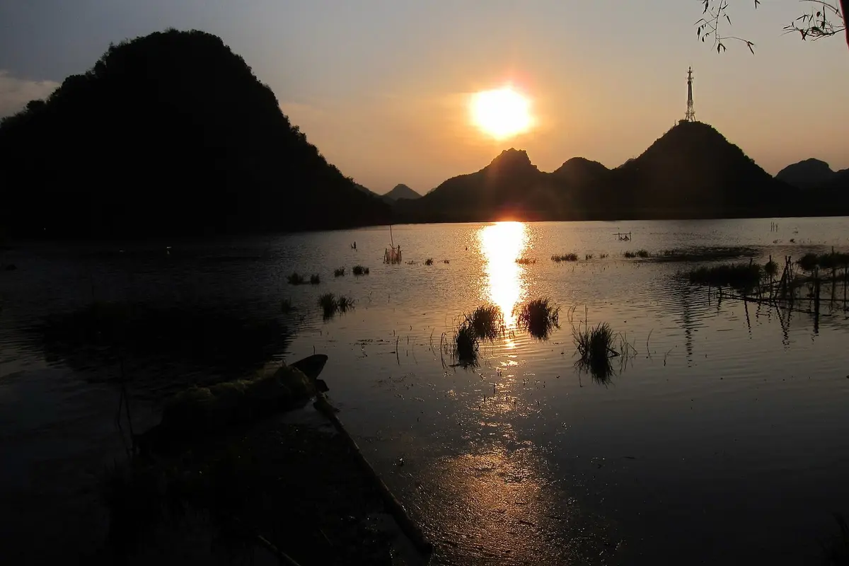 Sunset over Puzhehei lake scenery