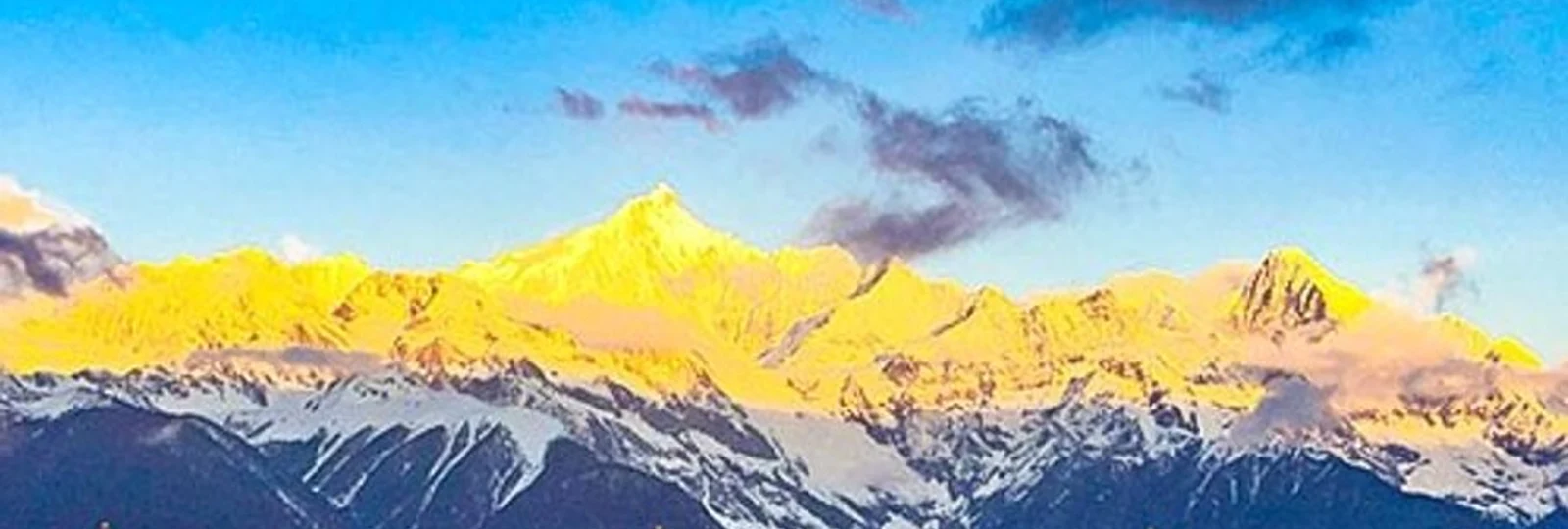 Sunrise over Meili Snow Mountain at Feilai Temple