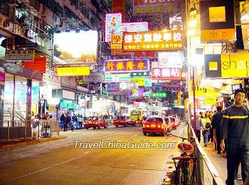 Archived Kowloon night street used as Coliseum arrival context