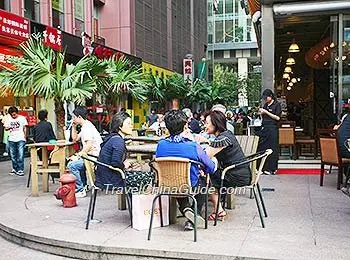 Outdoor bar seating on Nanjing Road in Shanghai
