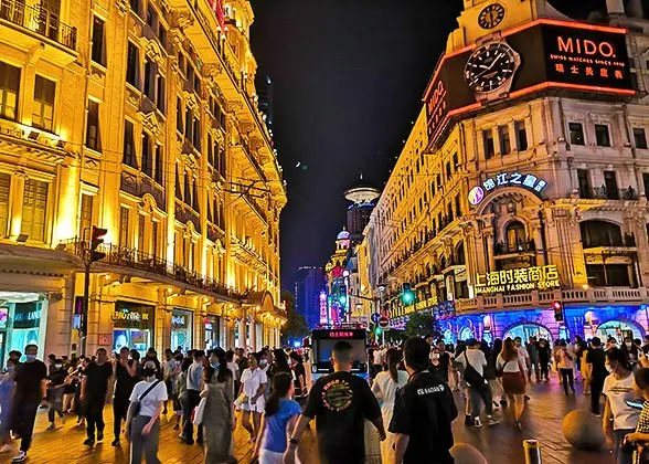 Central Shanghai street at night used for Jing’an city planning context