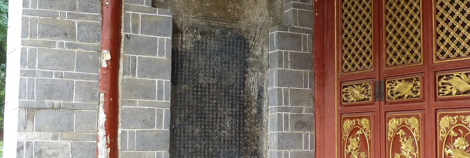 Carved doorway of a traditional building in Jianshui