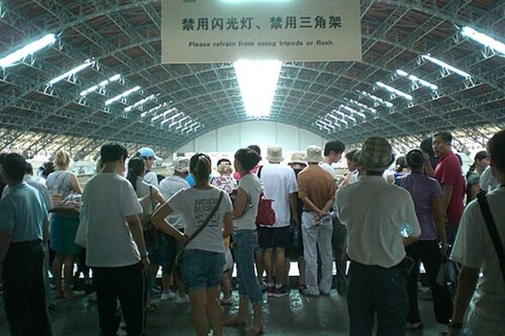 Visitors viewing the Terracotta Army museum